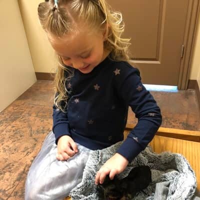 Little girl with puppy