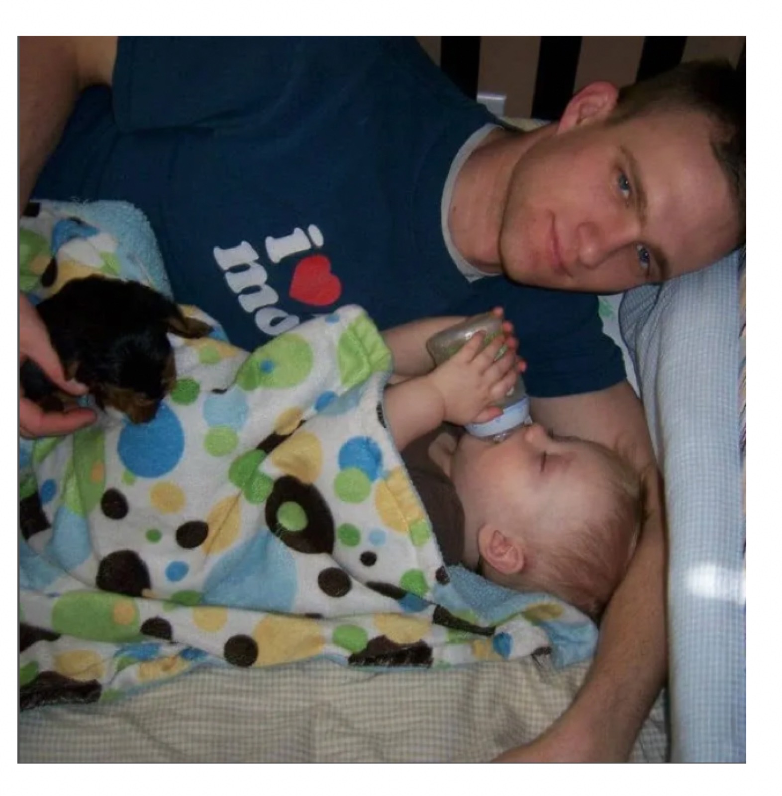 Todd with baby and pup 2011